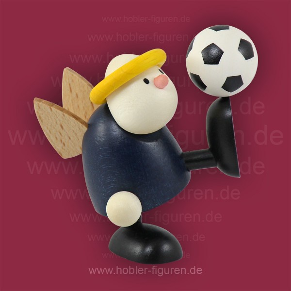 Hans mit Fußball balancierend