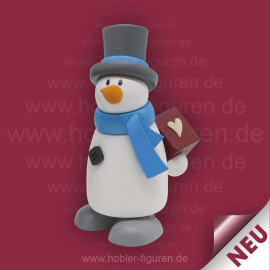 Schneemann Fritz mit Geschenk
